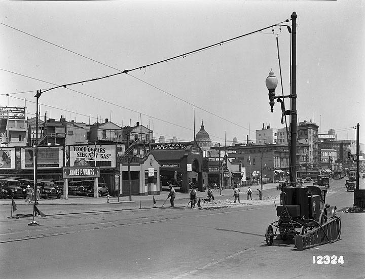 Work-Crew-Improving-Streetcar-Tracks-at-Market-Street-near-Gough-with-Air-Compressor-and-Overhead-Hose-Line August-6-1930-U12324.jpg