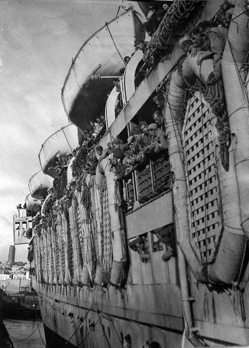 Monterey-with-returning-troops-at-Pier-15-Oct-19-1945 P82-019A 4267.jpg