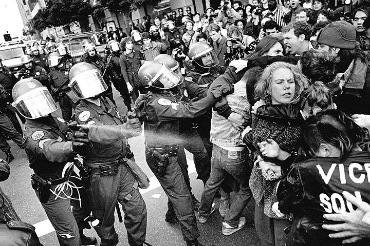 File:Cops-pepper-spraying-protestors-at-anti-Gulf-War-demo-1981-downtown-SF-by-Keith-Holmes.jpg