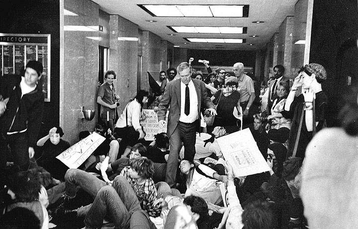 Die-In-Corporte-Warchest-Tour SF-March-1984-by-Keith-Holmes.jpg