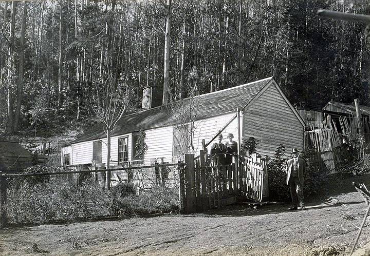 File:The-Old-home-in-the-Heart-of-the-Sutro-Forest,-back-of-Twin-Peaks,-built-about-1860.-Photo-taken-Jany-1925.-Jesse-B.-Cook-at-the-gate.jpg