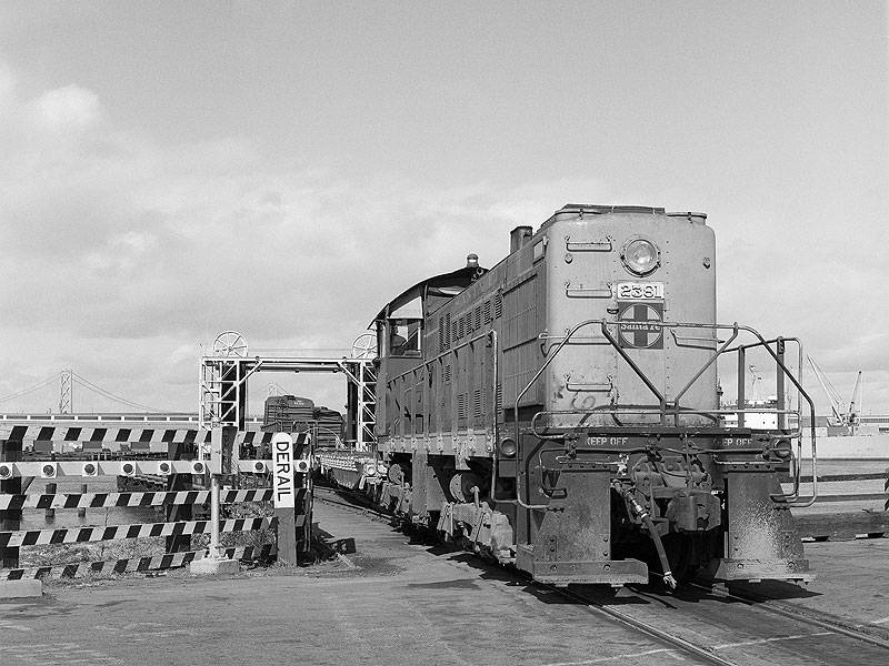 File:The-first-in-a-two-photo-set-shows-2381-pushing-a-cut-of-cars-onto-the-barge-at-the-China-Basin-slip.-Western-Railway-Museum-Archives.-Jeff-Moreau-collection.jpg