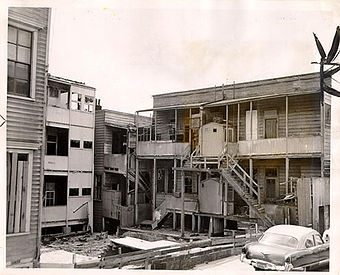 Dilapidated apartment buildings in the Western Addition 1953 AAC-1913.jpg