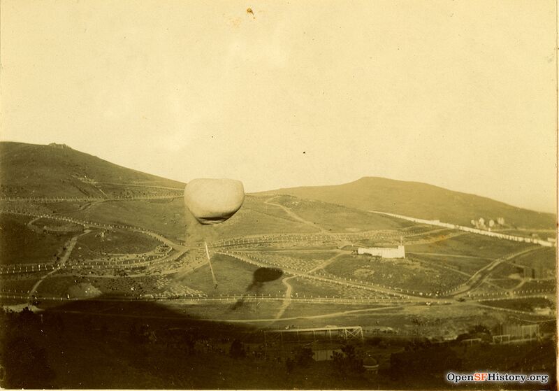 Balloon ascension 1899 Light-colored structure at right is a model of Morro Castle, located at approximately today's Mizpah and Sussex Street opensfhistory wnp130.00037.jpg