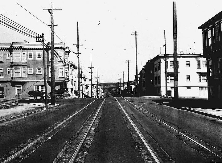 8th-Ave-north-at-Cabrillo-Beer-Drummer-at-left-Presidio-in-distance-1927-SFPL.jpg