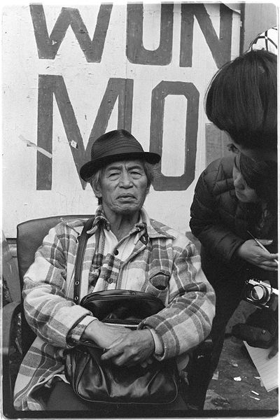 File:Wahat Tompao sits on the street outside the hotel at 848 Kearny, San Francisco Nancy Wong.jpg
