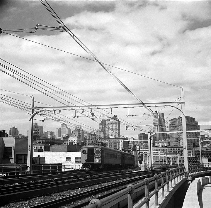 Key-train-on-First-Street-ramp-April-1939-Dorothea-Lange.jpg