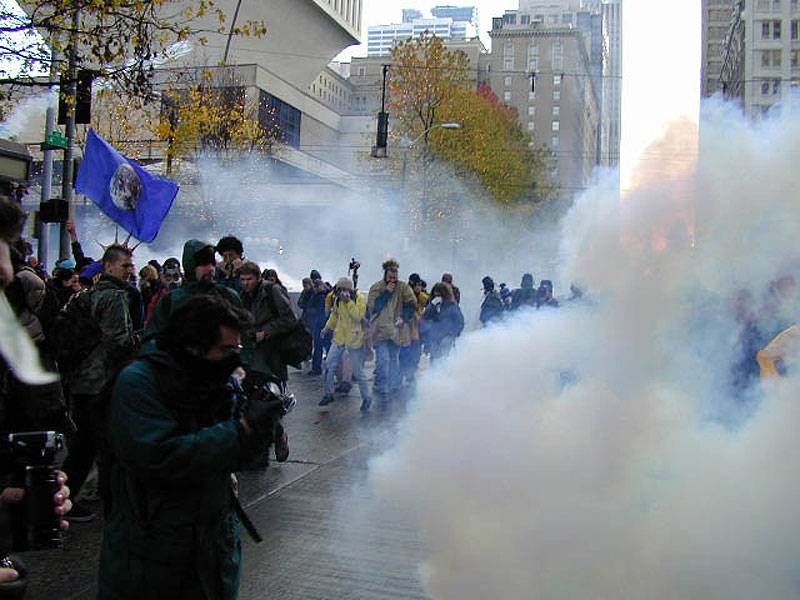 File:Teargas-on-street-with-earth-flag.jpg