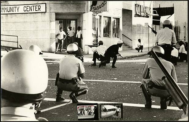 File:Police officers in riot gear drawing their guns on the residents during the 1966 Bayview-Hunters Point riots AAK-1650.jpg