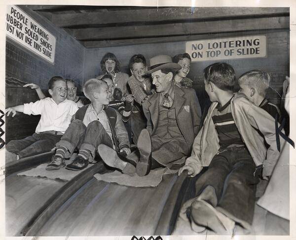 Charles Coryell with a group of children from his neighborhood at Playland AAB-9981.jpg