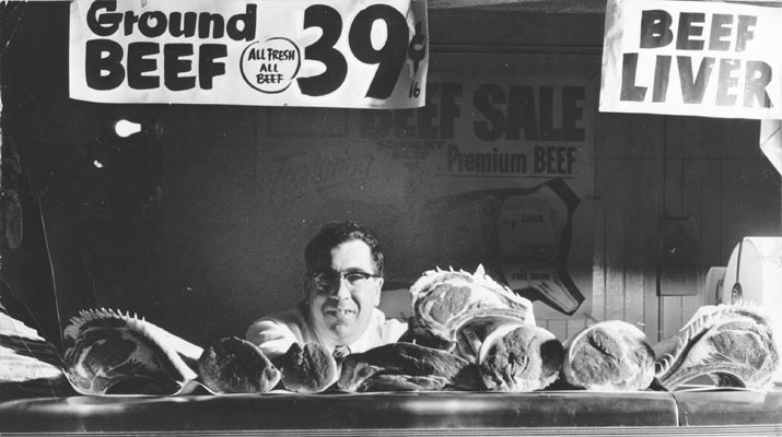 File:Emmett Rose and his meat counter 1954 AAC-6870.jpeg