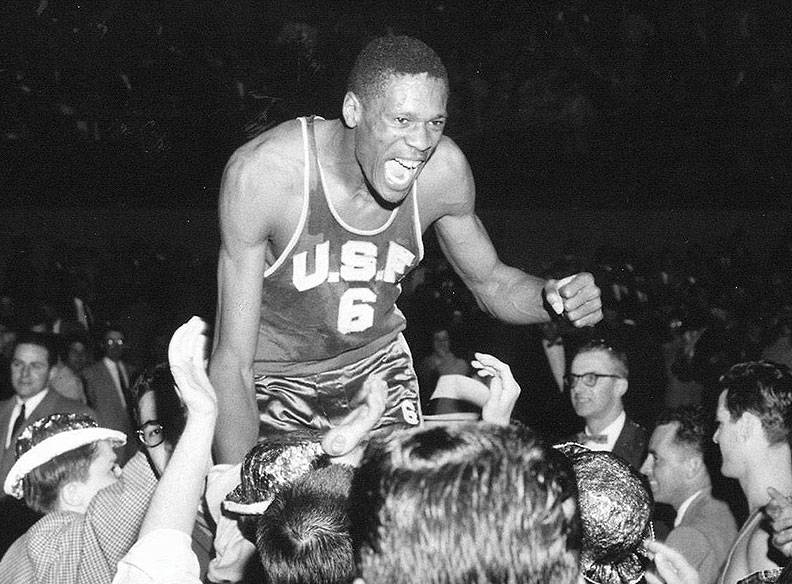 File:1956-champs-russell-lifted-up-by-usf-fans-1.jpg
