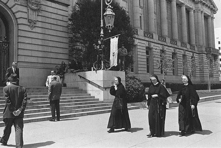 File:Hells-Angel-reads-behind-nuns-at-City-Hall 00010009 Chuck-Gould.jpg