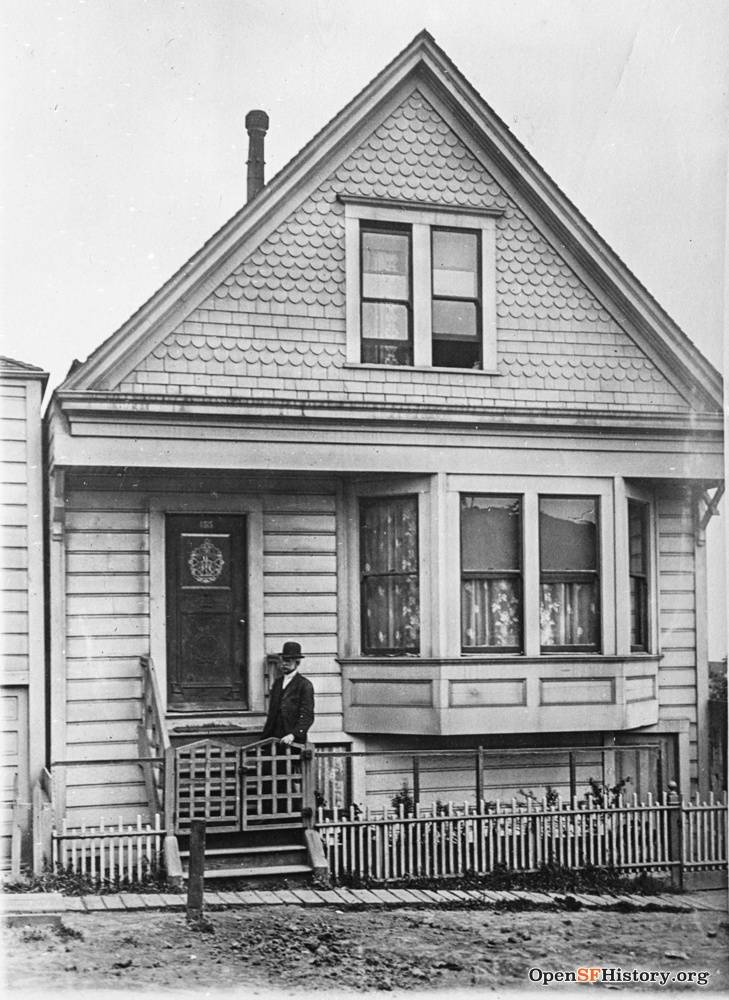 55 Anderson (built 1908), west side between Jarboe and Tompkins. Edwardian cottage that looks very similar today. Man poses in front wnp37.02688.jpg