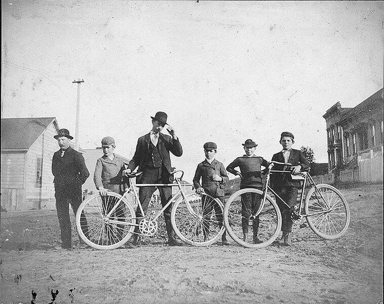 File:Boys-and-bicycles-posed-in-the-middle-of-a-dirt-street,-likely-today's-Fairfax-Avenue,-about-1904.jpg