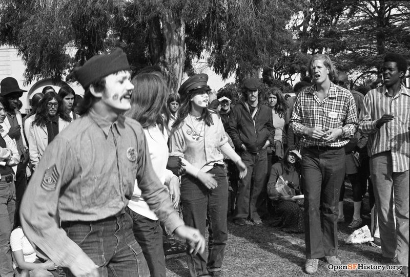File:Kezar Triangle, people watching a performance. Anti Vietnam War March, from the Golden Gate Park Panhandle to Kezar Stadium wnp28.3215.jpg