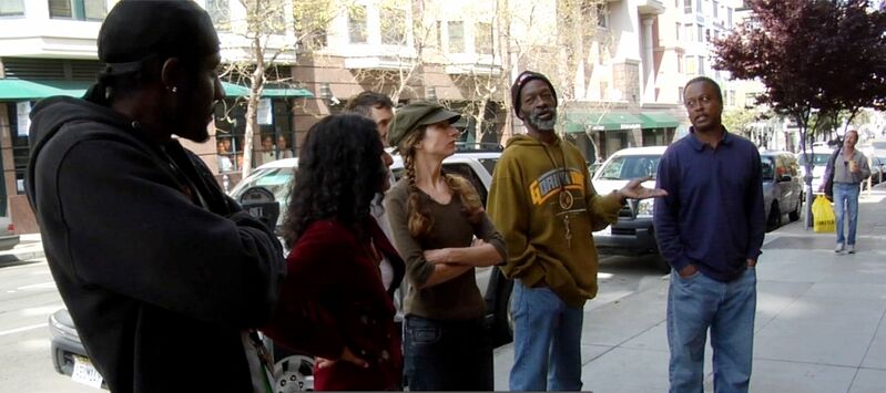 File:WindowsIntoTheTenderloin discussions.jpg