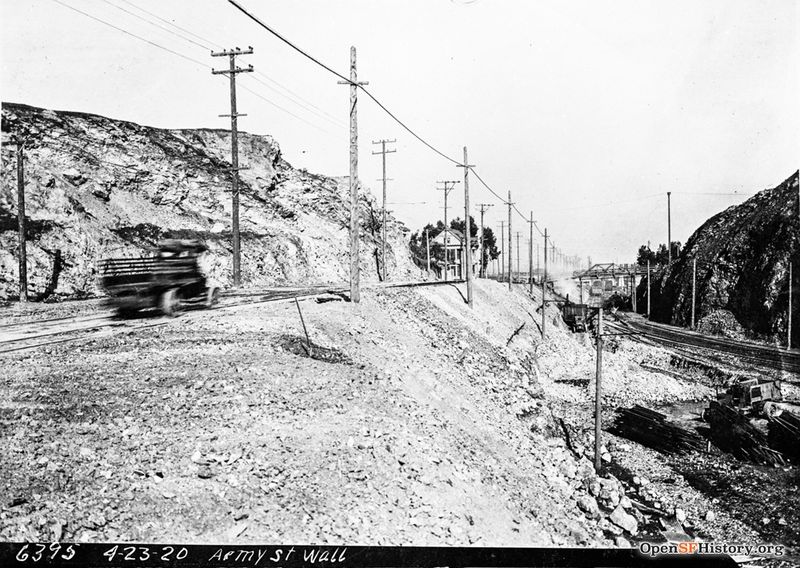 File:Army Street Wall, View east on Army Street (now Cesar Chavez) near present day Evans. Ocean Shore Railway tracks at right, footbridge at Connecticut Street in distance--wnp36.02268.jpg