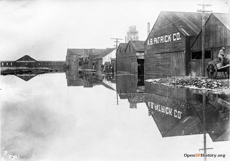 File:Fairfax Ave. NW from Quint, Cal. Glue works (Fairfax and Rankin) and A.B. Patrick tannery flooded, Southern Pacific viaduct trestle background left dpwbook15 dpw2941 Jan 4 1916wnp36.01142.jpg