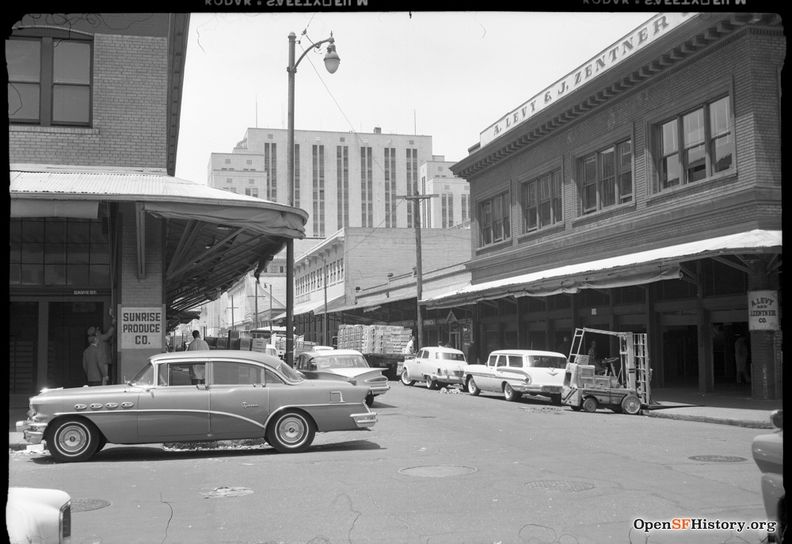 May 1959 Old Produce District looking west; Appraisers Building background. Sunrise Produce Co., Levy and Zentner Co. with forklift in front wnp14.11134.jpg