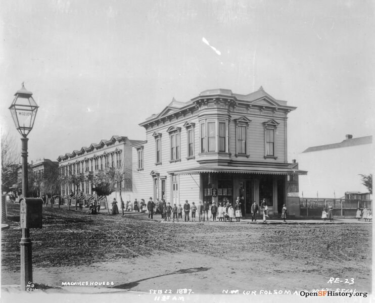 File:View across dirt intersection of 20th and Shotwell to corner grocery store and bar run by Charles G. Friedrich Feb 1887opensfhistory wnp71.1614.jpg