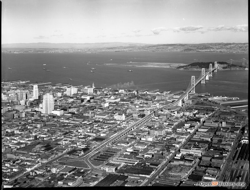 View east over South of Market, Bay Bridge and 5th Street on ramp, Treasure Island under construction c 1937 wnp26.1006.jpg