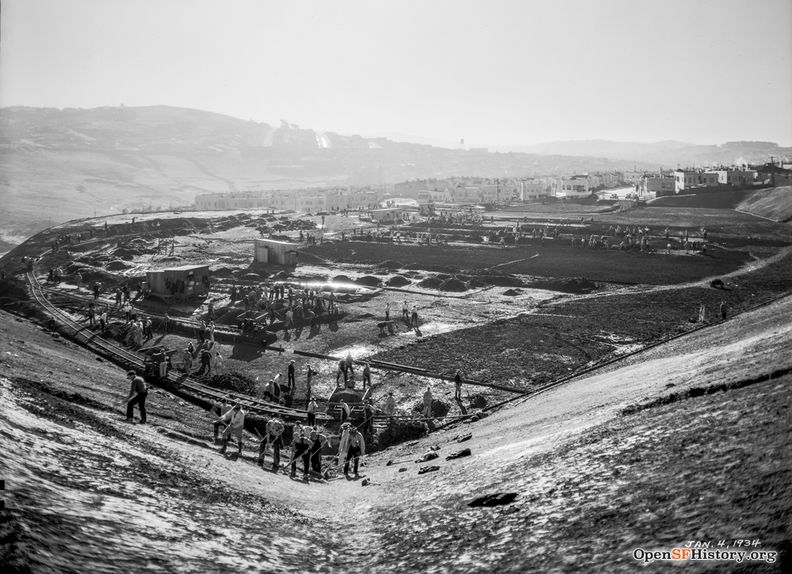 Jan 4 1934 St. Mary's Park, later St. Mary's Recreation Center, under construction. View Southwest toward the Excesior and McLaren Park. Men grading field by hand wnp14.2795.jpg