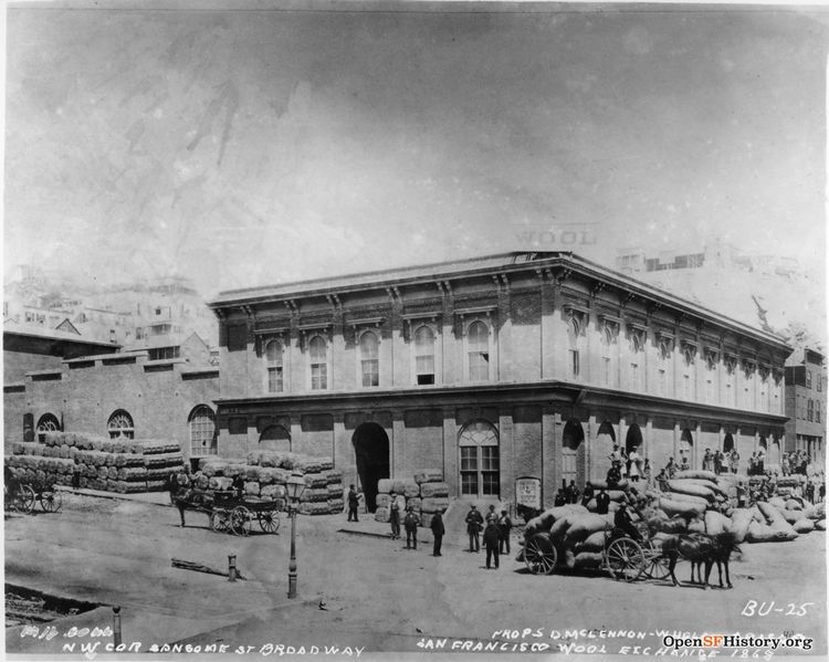 File:San Francisco Wool Exchange 1868. NW corner Sansome St Broadway. Props. D. McLennon, Whelan, Grisar BU-25 Sack and bales piled up on sidewalk, laden horse-drawn wagon F810 BU-025 GGNRA-Behrman GOGA 35346 wnp71.1203.jpg